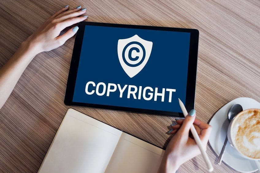 Copyright icon on screen. Patent Law and Intellectual Property. Business, Internet and Technology Concept.